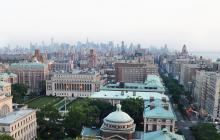 Aerial view of Columbia's Morningside Campus with downtown New York in the distance