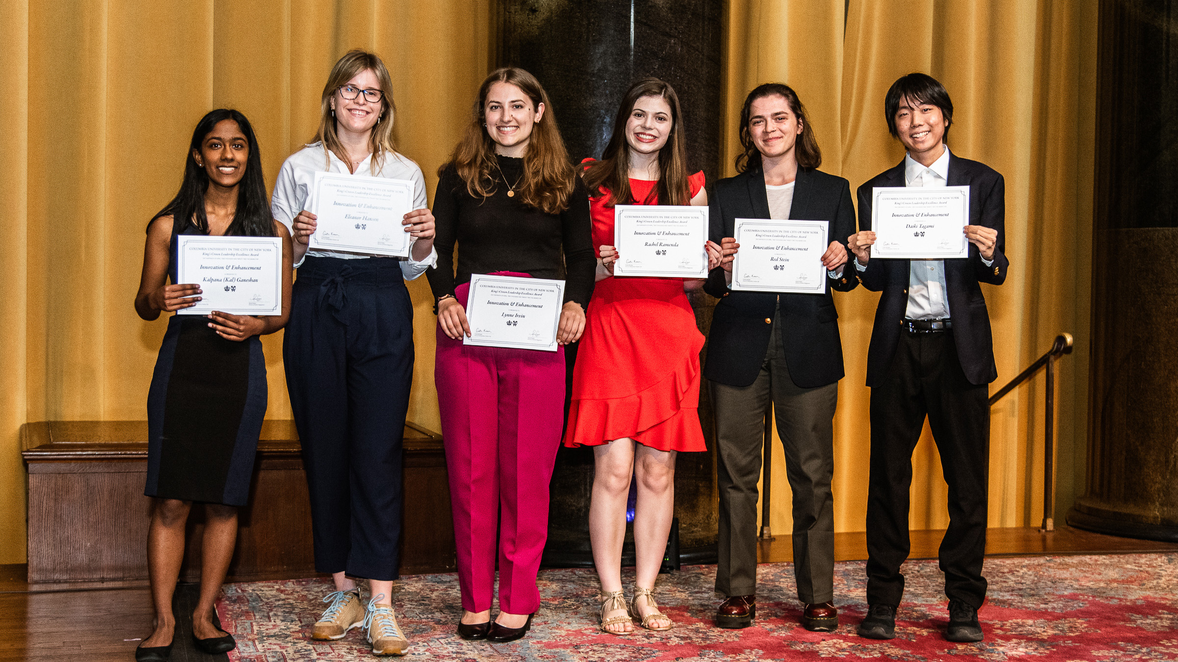 Students pose with award certificates at the Leadership and Excellence Awards Ceremony