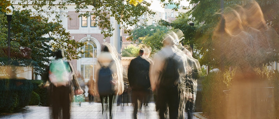 Soft focus image of students walking on Columbia's campus
