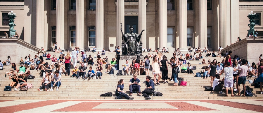 Students relaxing on the steps of Columbia's Low Library